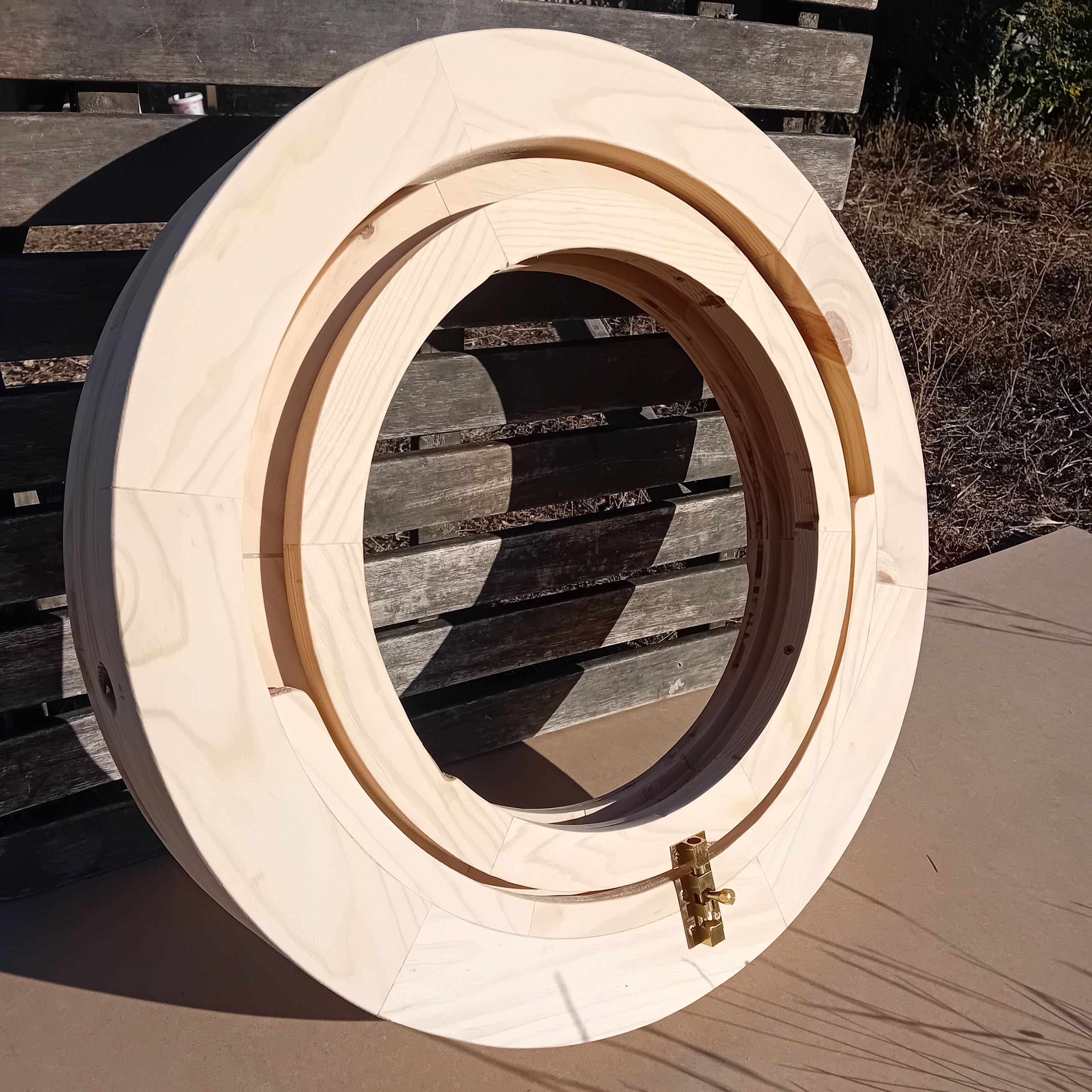 round wooden window