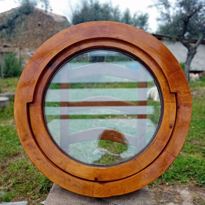 Enhance Your Home with the Timeless Charm of a Round Wooden Window